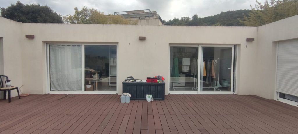 Baies vitrées avant pose de films solaires protection thermique à Oletta par Caps-2B